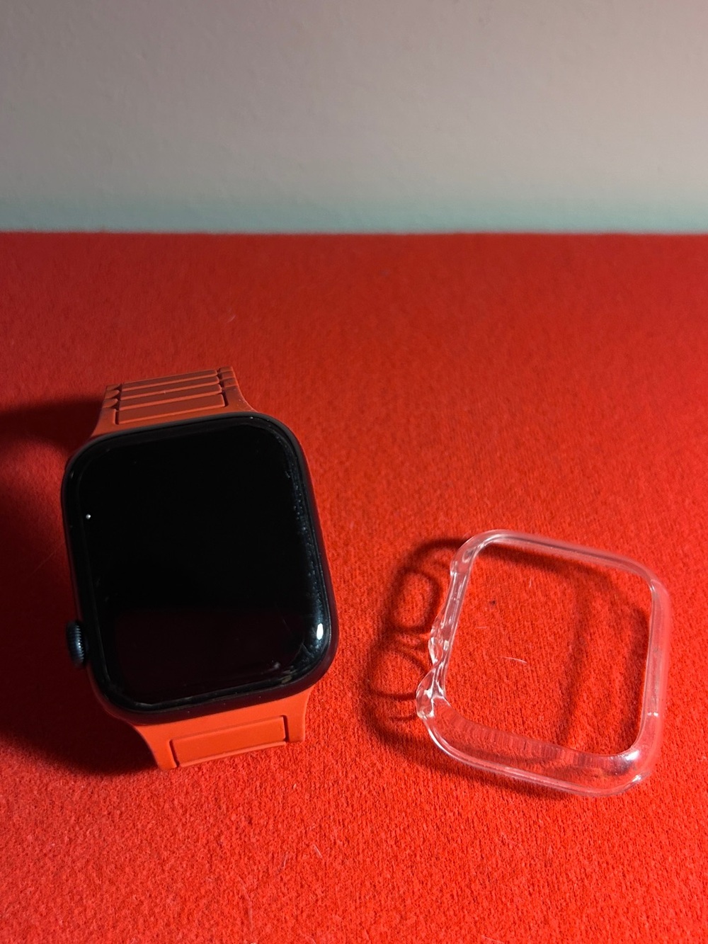 Apple Watch with Bright Red Sport Band and Clear Case